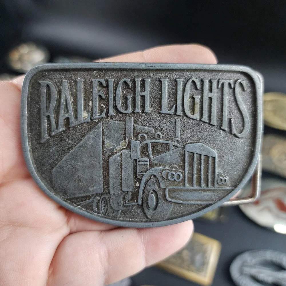 Vintage Raleigh Lights Cigarettes Belt Buckle Semi Freightliner Trucking